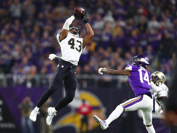 New Orleans Saints free safety Marcus Williams (43) intercepts a pass intended for Vikings receiver Stefon Diggs (14) . Mandatory Credit: Mark J. Rebilas-USA TODAY
